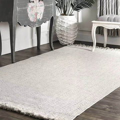 南国ナチュラルな雰囲気に!職人手織り製フリンジカーペット(SOFTY)